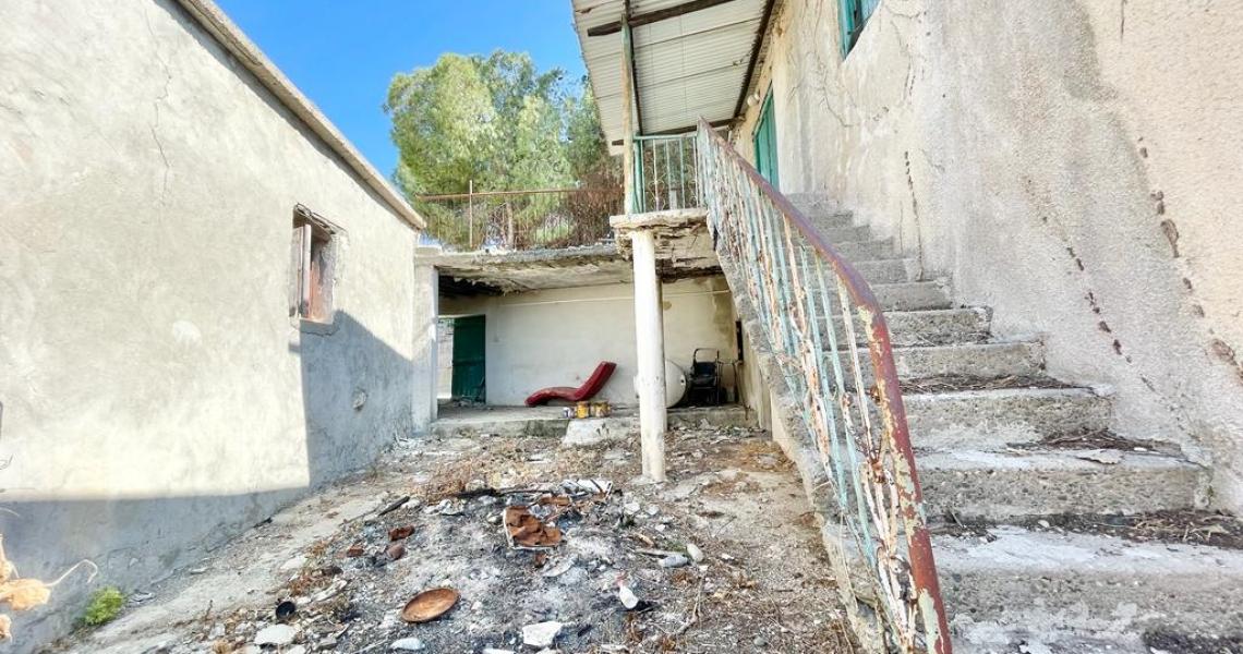Large village plot with existing house — Paphos
