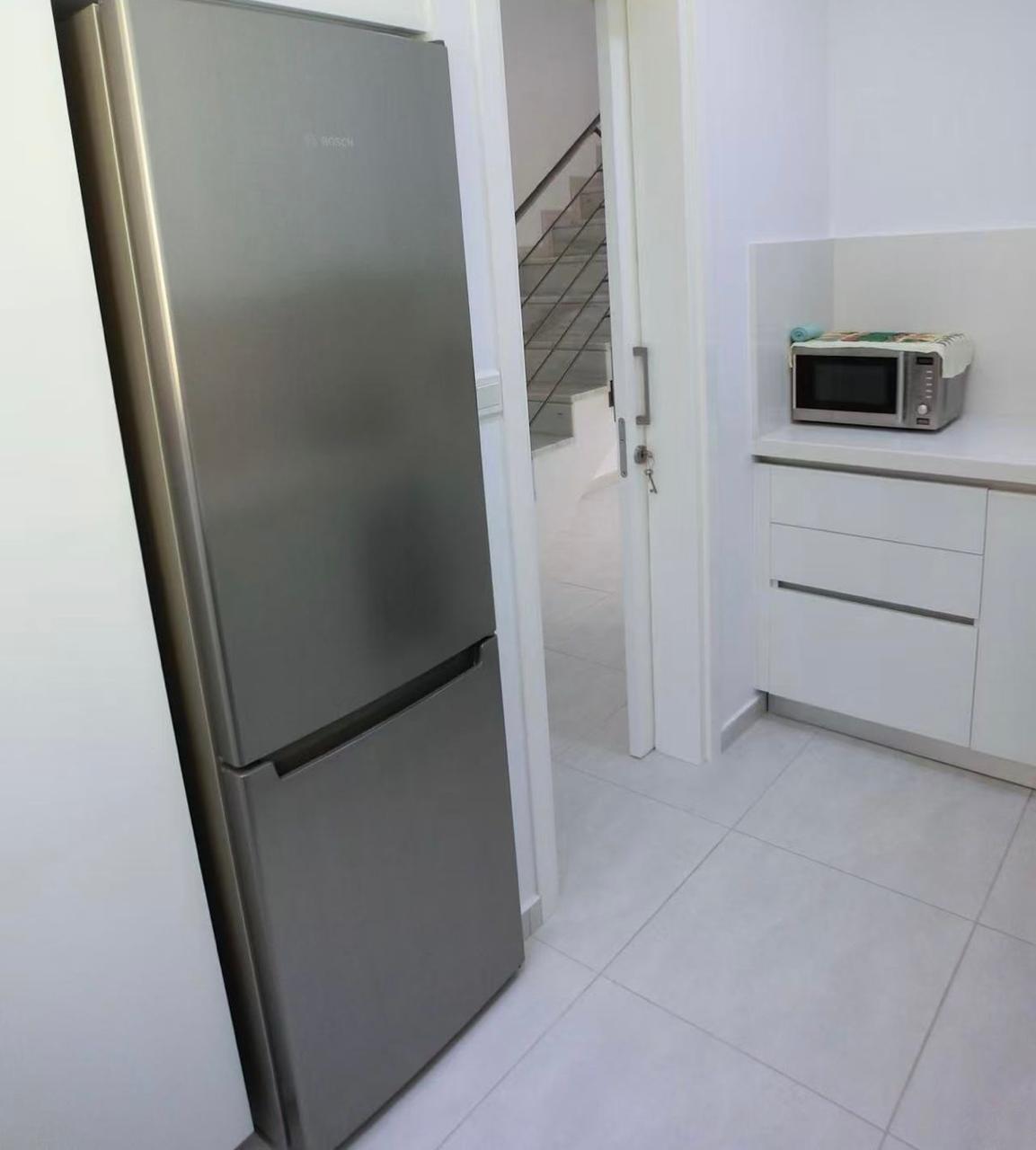 Two-bedroom townhouse with a separate kitchen and a covered veranda in a complex with a pool — photo 4