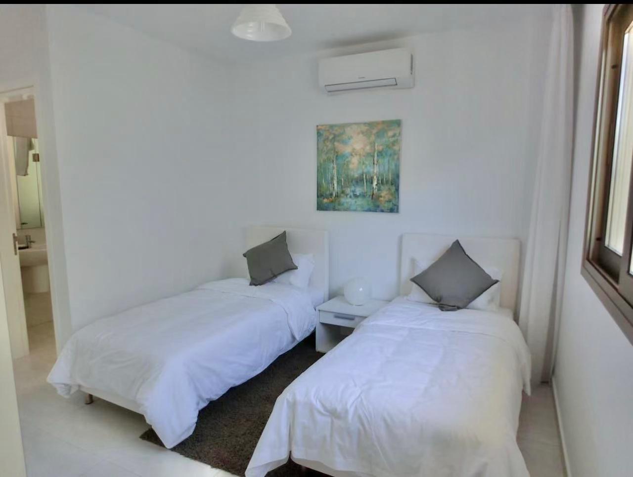 Two-bedroom townhouse with a separate kitchen and a covered veranda in a complex with a pool — photo 6